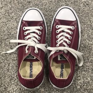 Maroon Converse sneakers